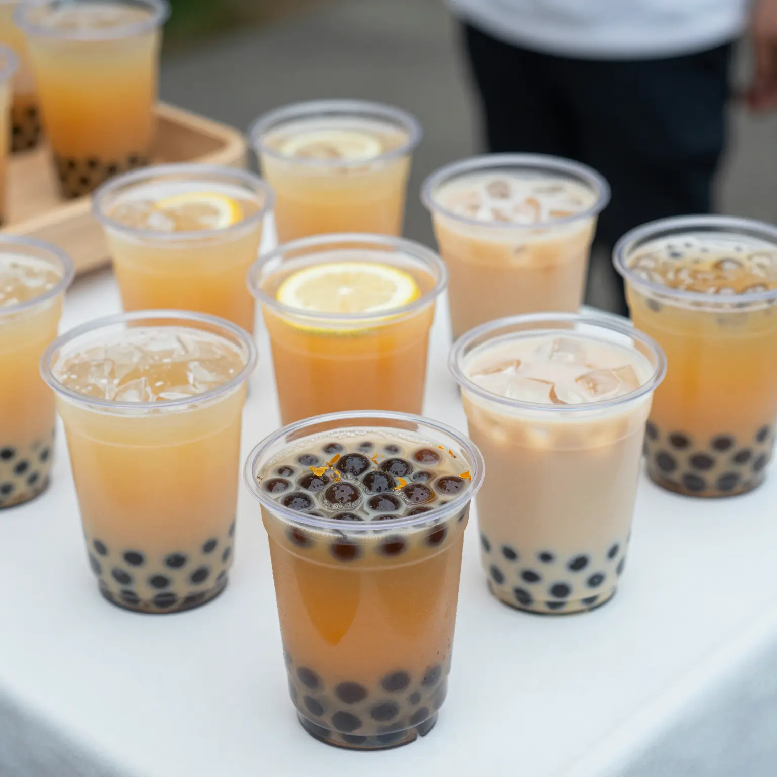 Colorful beverages in 3oz clear plastic cups
